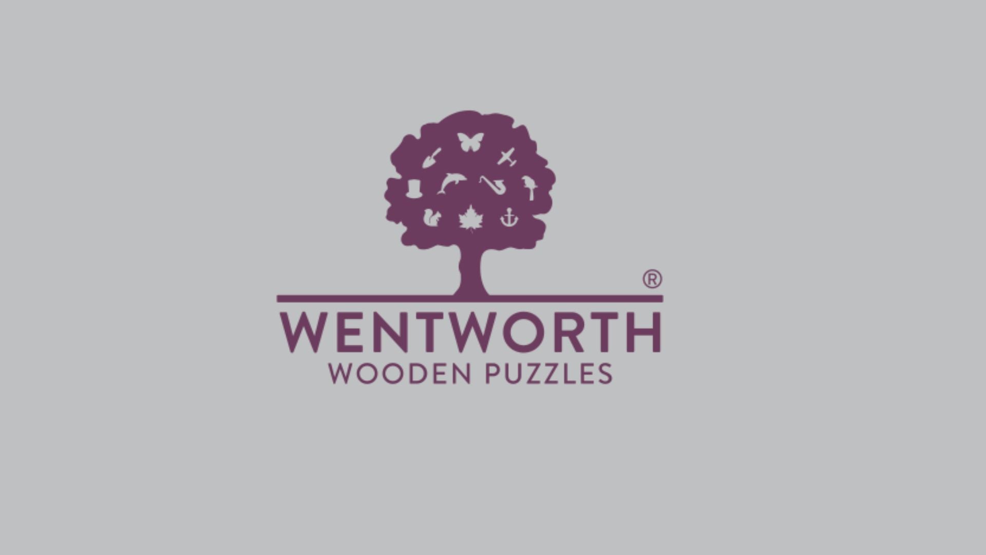 Wentworth Wooden Puzzles box and bag containing puzzle pieces - a Wentworth Wooden Puzzles box and bag containing puzzle pieces - a